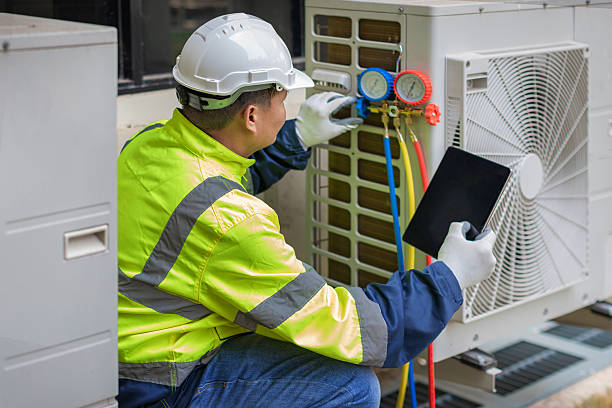 Professional Air Conditioning Repair technician working in Zavalla, TX